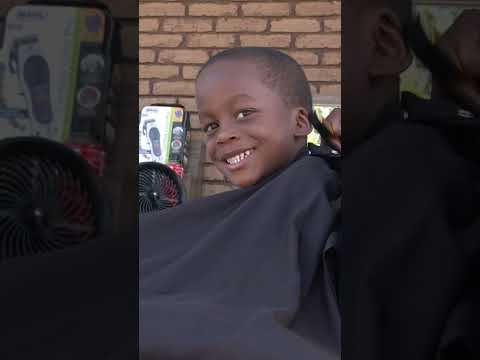 Mobile Barbershop Offered Kids Free Haircuts to Support Elementary Education